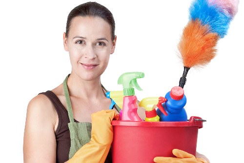 Carpet cleaner preparing a transparent quote for a W14 property